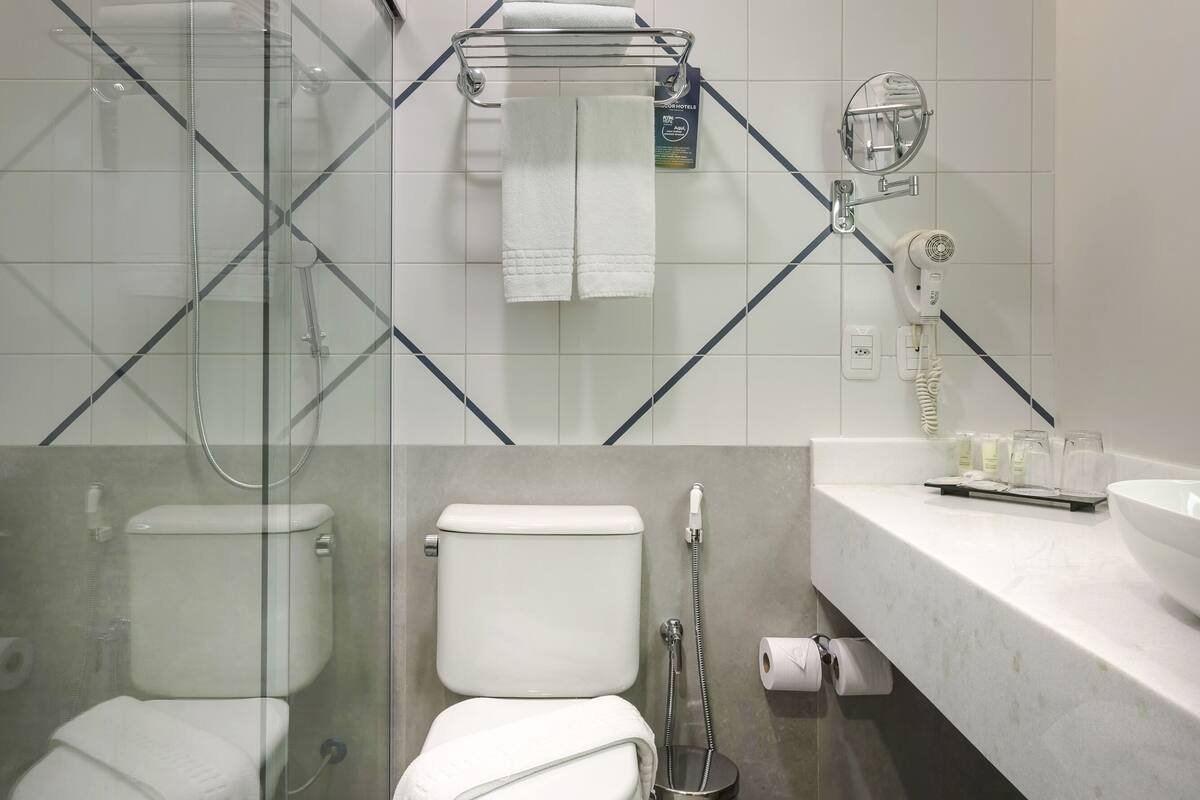 shower, eco-friendly toiletries, hair dryer, towels