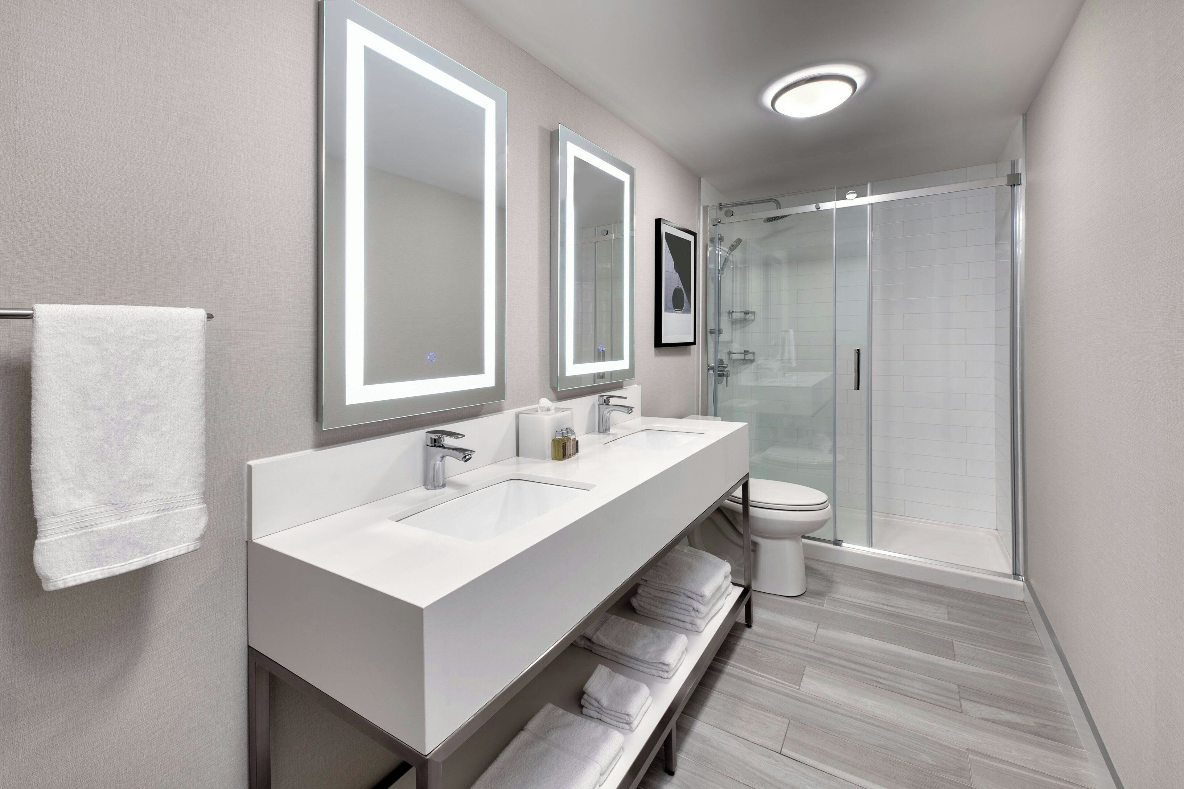 junior suite, 1 bedroom | bathroom | combined shower/bathtub, rainfall showerhead, designer toiletries