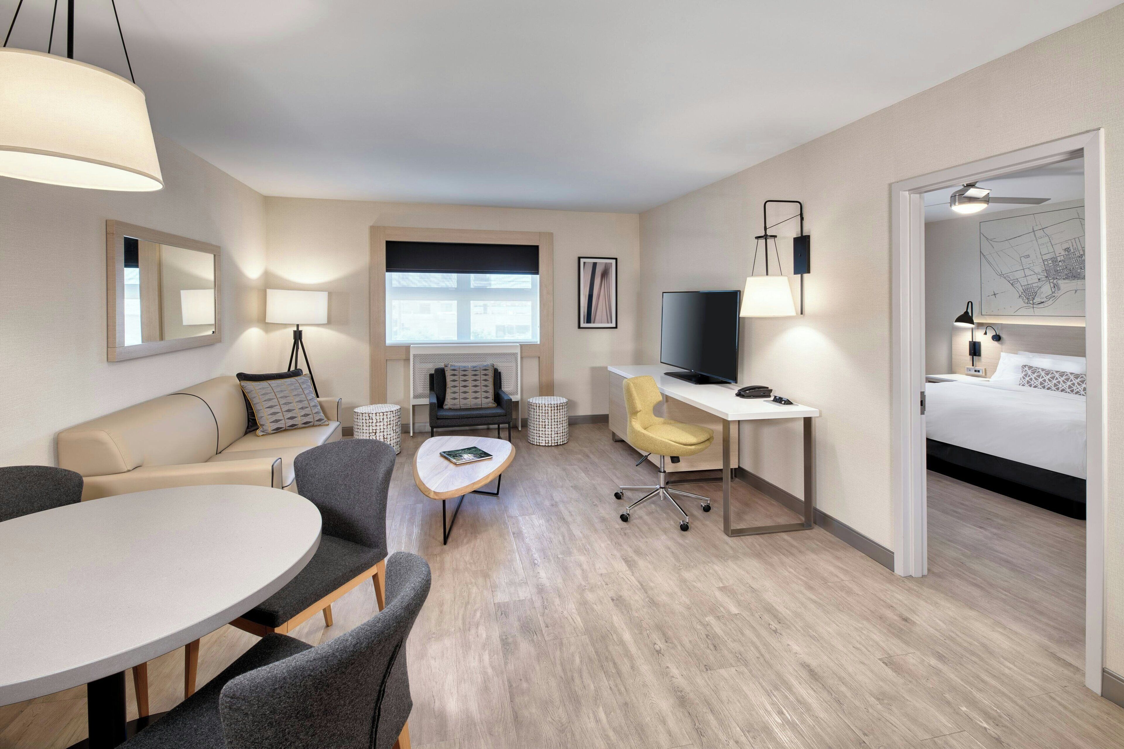 junior suite, 1 bedroom | living area | 49-inch tv with cable channels, netflix, ipod dock