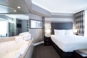 Jacuzzi Suite, 1 King Bed, Sofa Bed | 1 bedroom, premium bedding, pillowtop beds, in-room safe