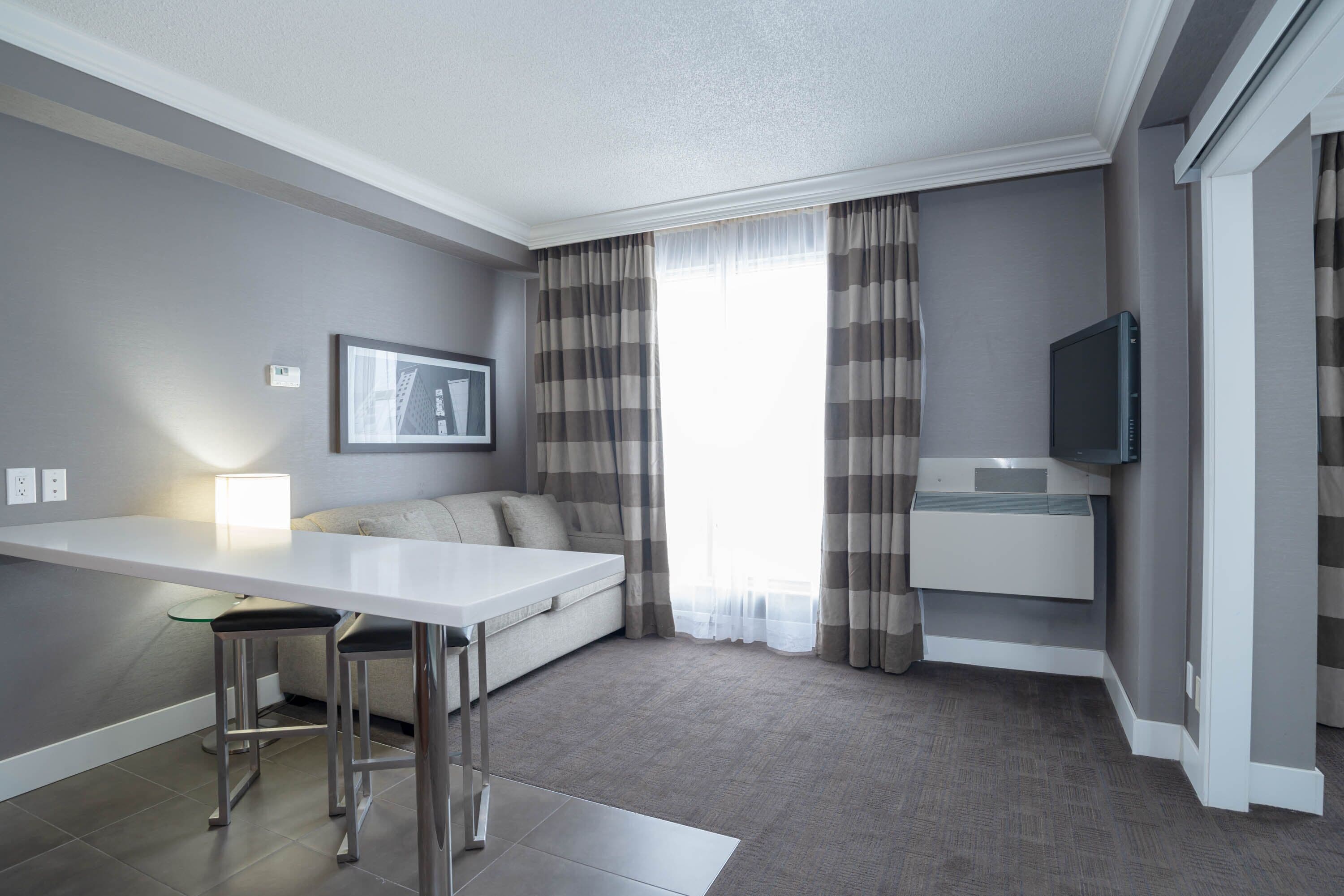 standard suite, 1 king bed with sofa bed, kitchen | living area | 32-inch flat-screen tv with cable channels, tv