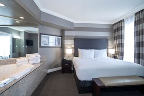 Jacuzzi Suite, 1 King Bed, Sofa Bed | 1 bedroom, premium bedding, pillowtop beds, in-room safe