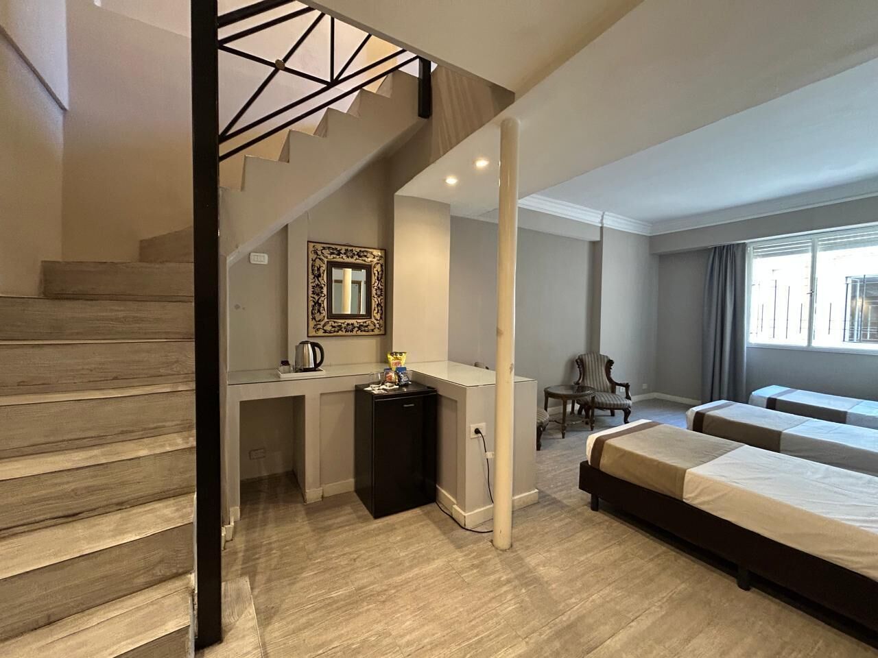 Premium bedding, down comforters, pillowtop beds, in-room safe