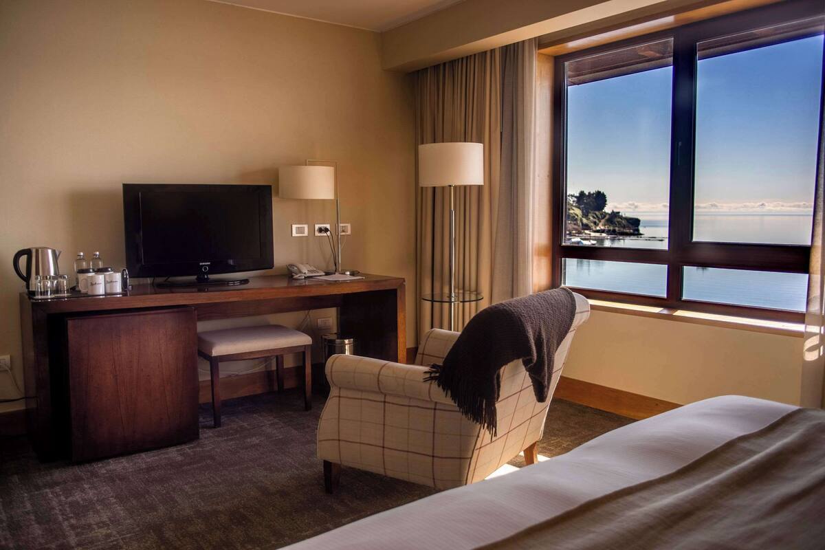 premium room, 1 king bed, non smoking (volcano view) | 1 bedroom, minibar, in-room safe, desk