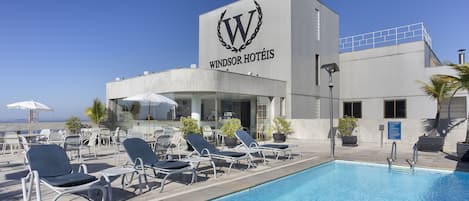 Outdoor pool, pool umbrellas, pool loungers