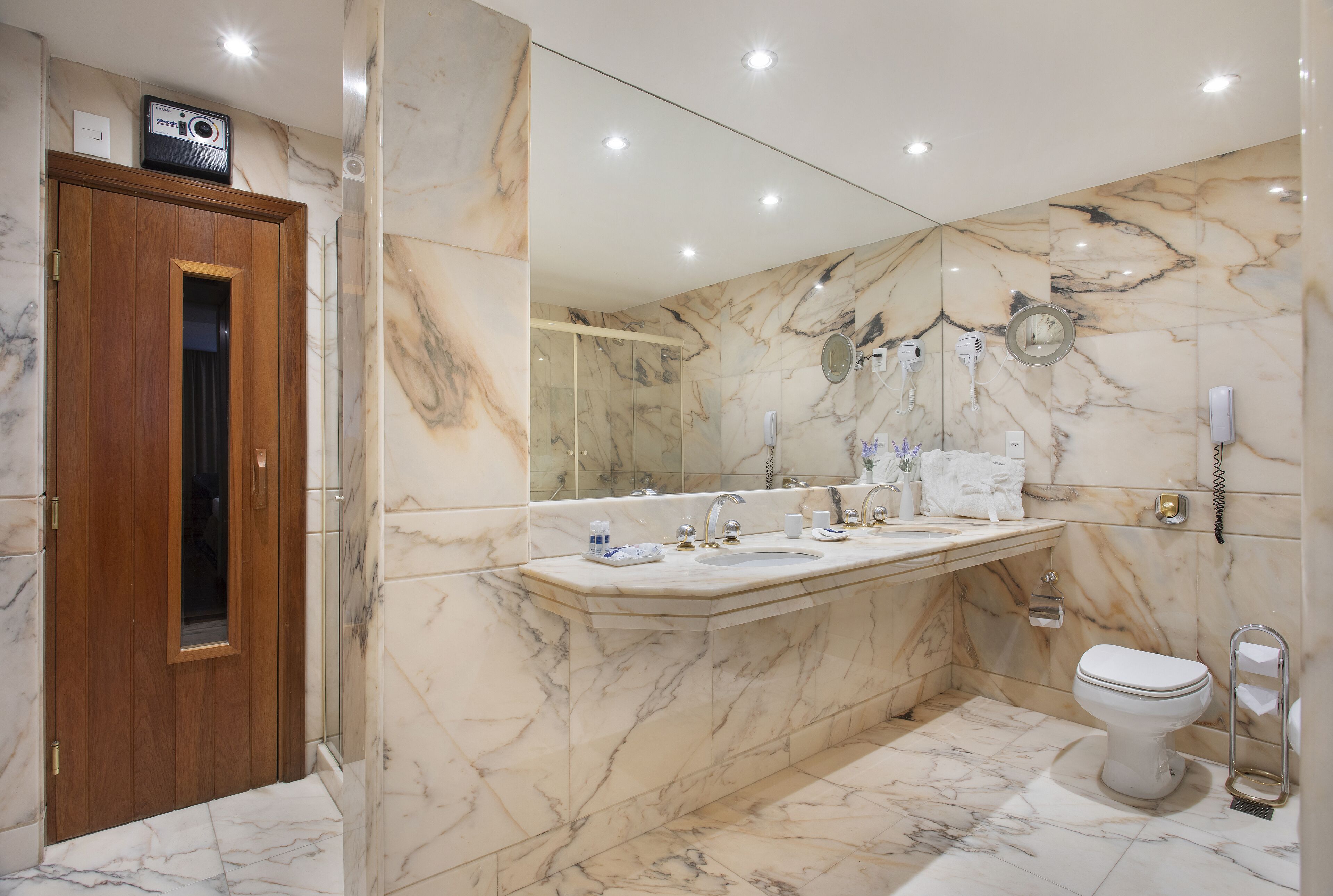 executive suite with city view | bathroom | shower, free toiletries, hair dryer, towels