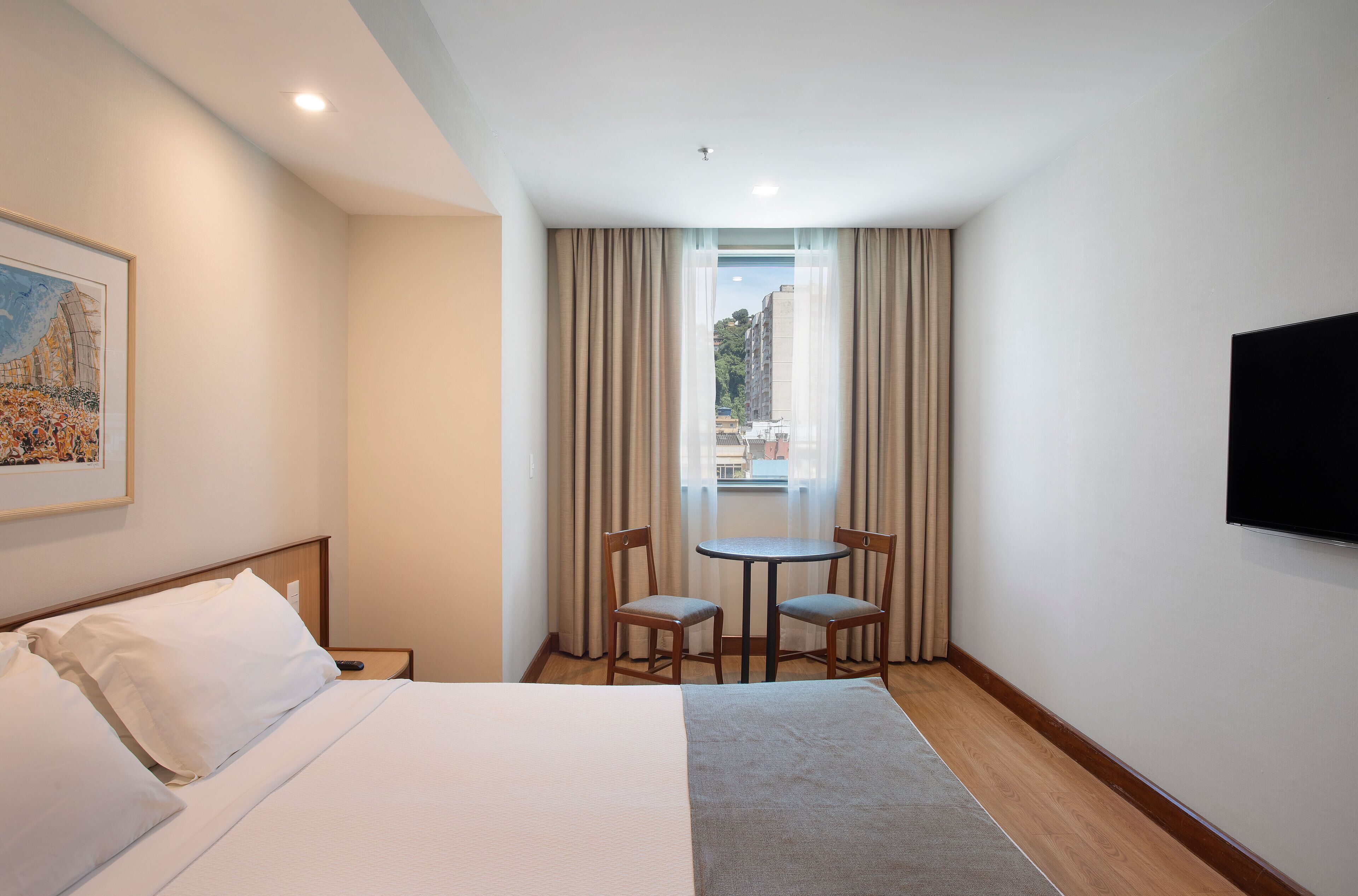 executive superior with double bed and city view | minibar, in-room safe, desk, laptop workspace