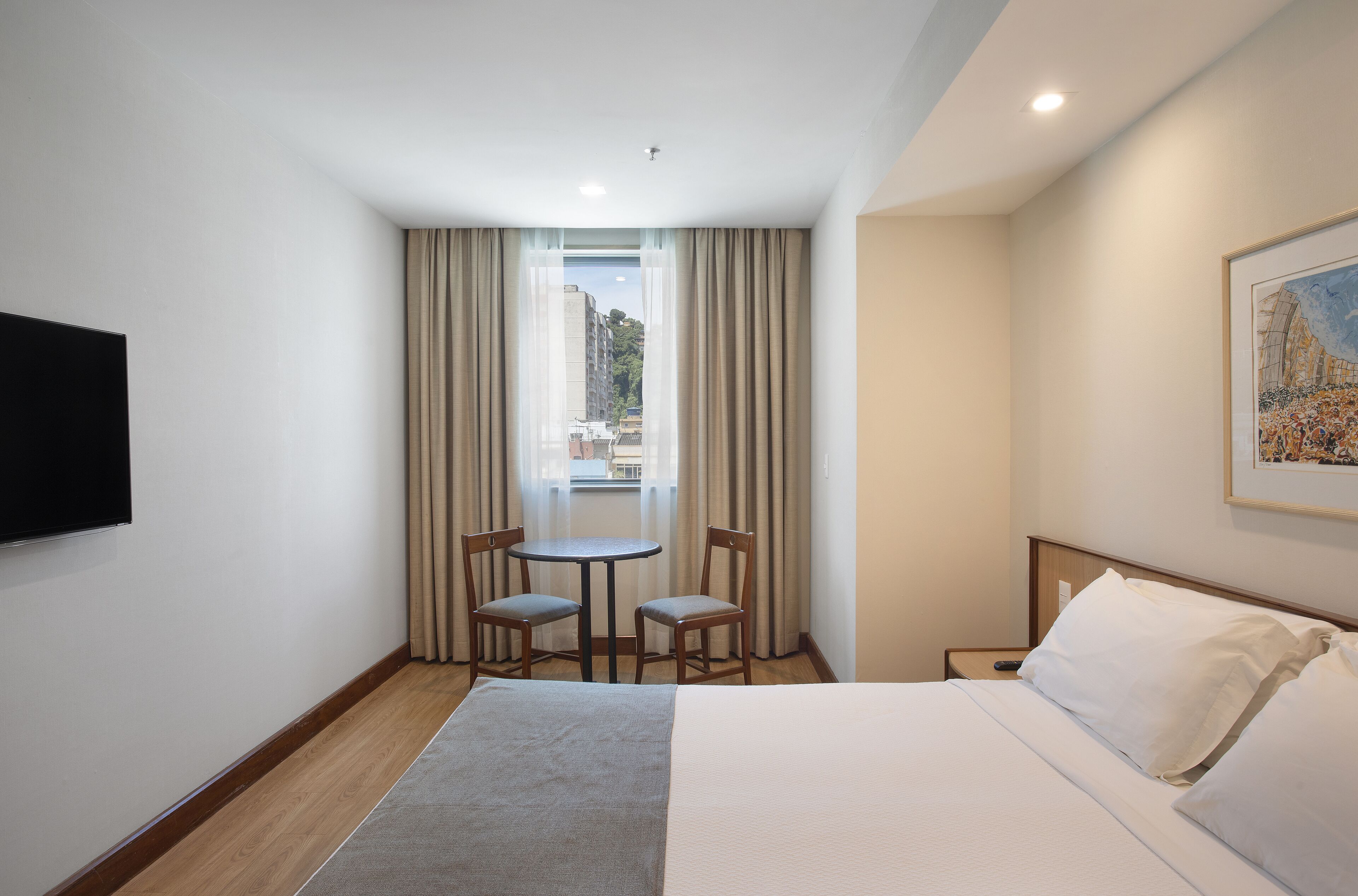 executive superior with double bed and city view | minibar, in-room safe, desk, laptop workspace