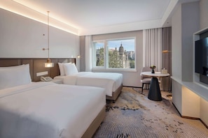 Ropa de cama de alta calidad, edredones de plumas, minibar y caja fuerte