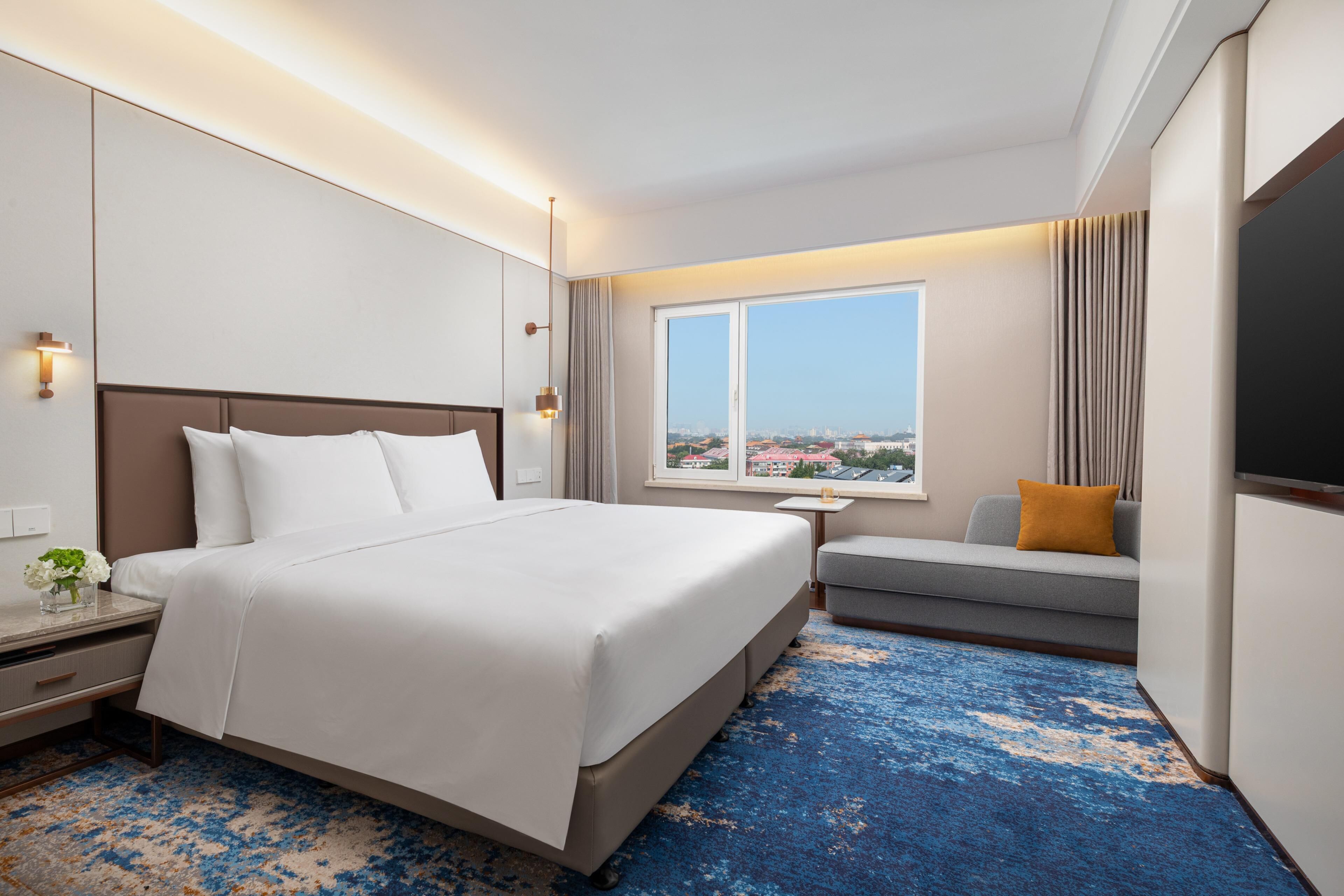 Ropa de cama de alta calidad, cubrecamas y minibar 