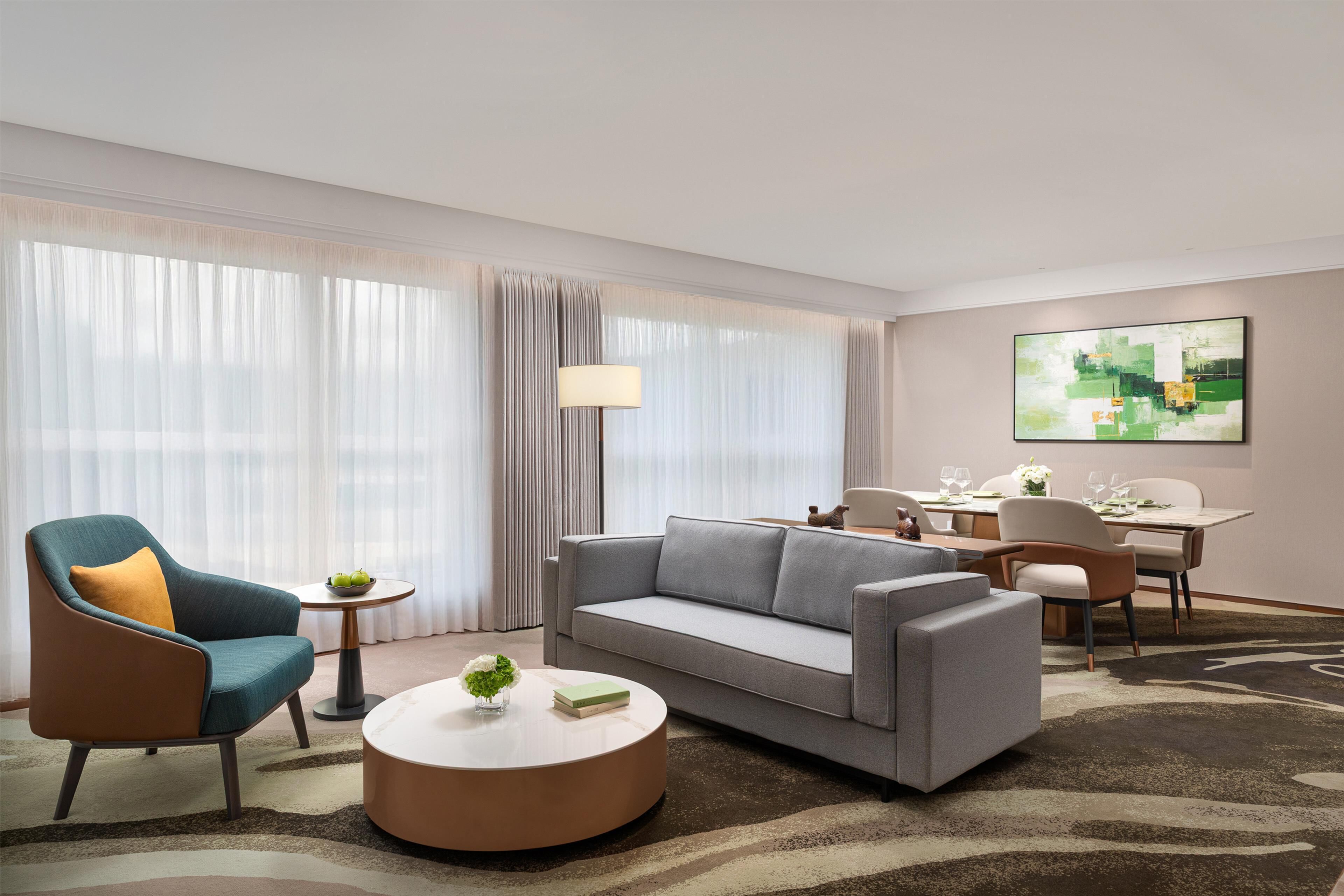 Premium bedding, down comforters, minibar, in-room safe