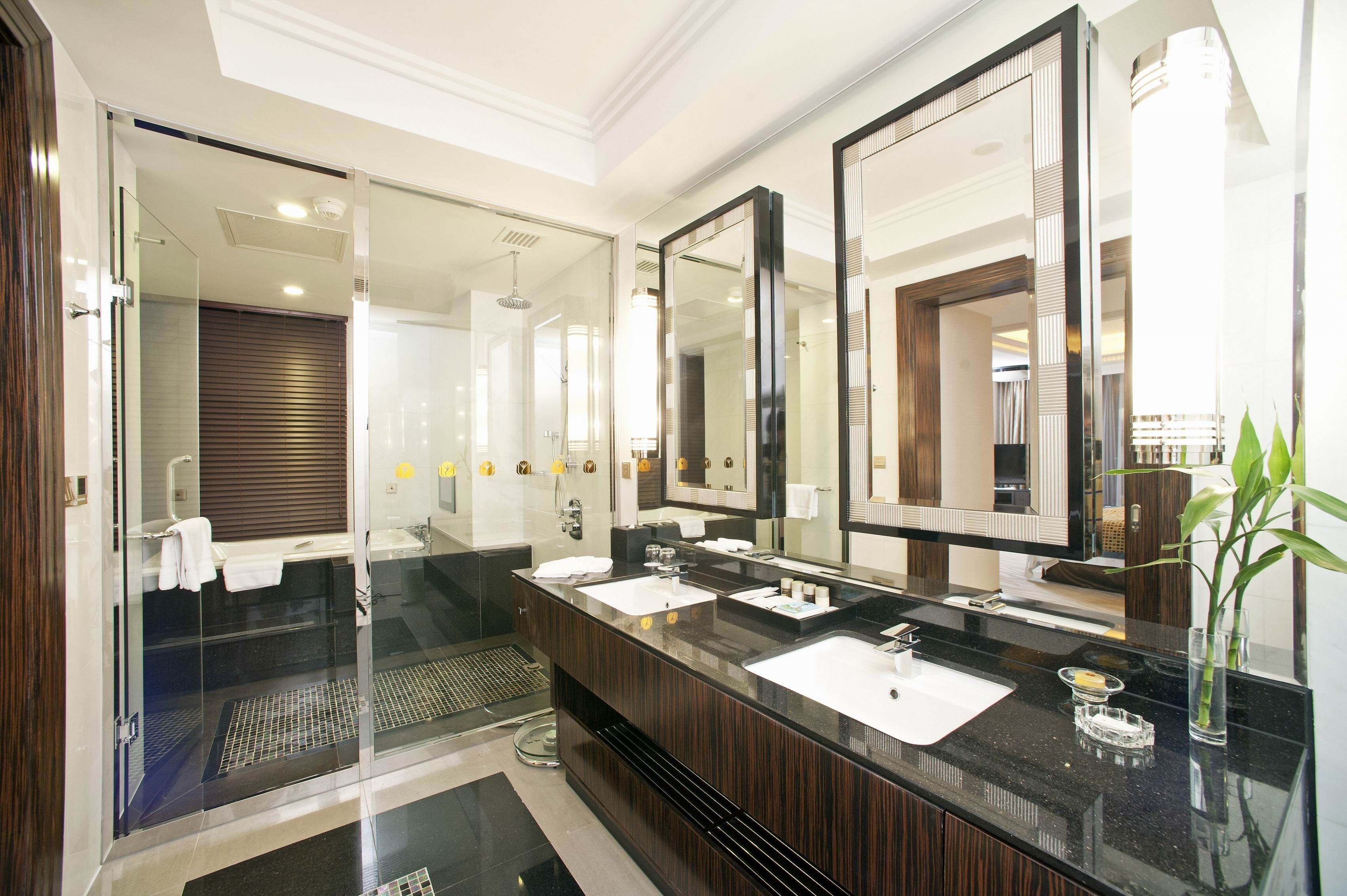 luxury suite | bathroom | separate bathtub and shower, deep-soaking bathtub, free toiletries