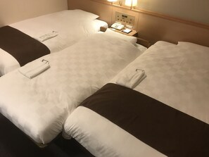 Triple Room with 2 Single Beds and Extra Bed, Non Smoking (Room Size, 18 sqm) | Down comforters, in-room safe, desk, blackout drapes - Kagoshima Tokyu Rei (Kagoshima)