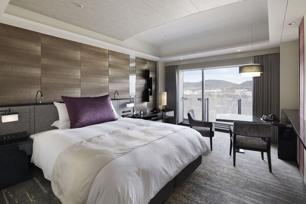 Premium bedding, down duvets, minibar, in-room safe