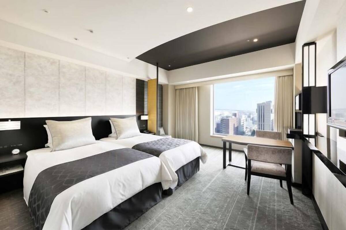 Ropa de cama de alta calidad, edredón y minibar 