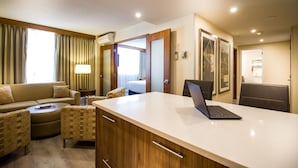 Premium Room, 2 Bedrooms | Living area | 30-inch flat-screen TV with cable channels, TV, pay movies - International Hotel Calgary (Calgary)