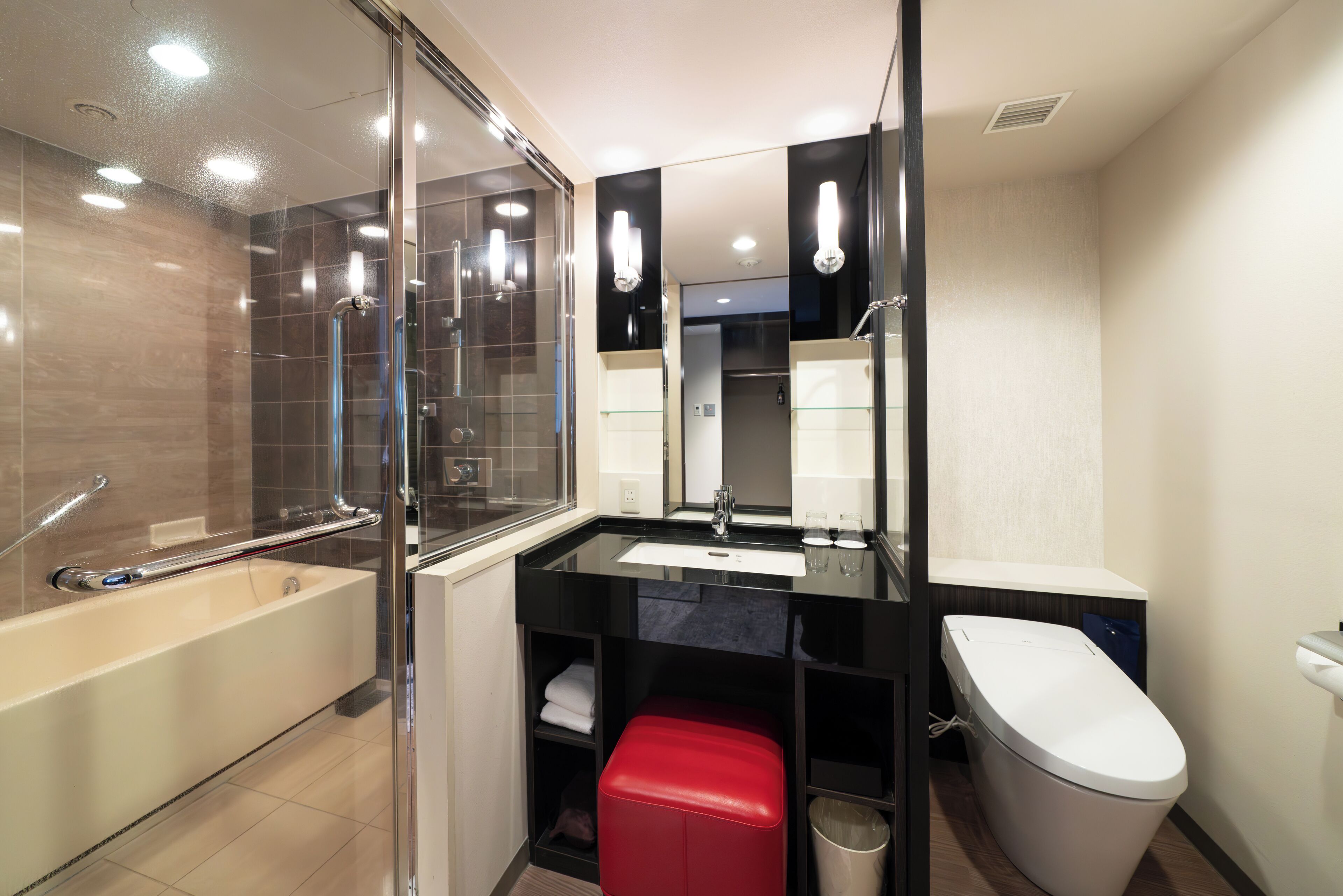 combined shower/bathtub, deep-soaking bathtub, hair dryer, slippers