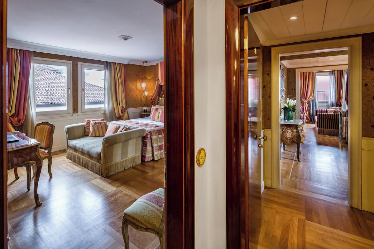 Family Junior Suite, 2 Bedrooms - Kids & Teens Free | 1 bedroom, premium bedding, minibar, in-room safe
