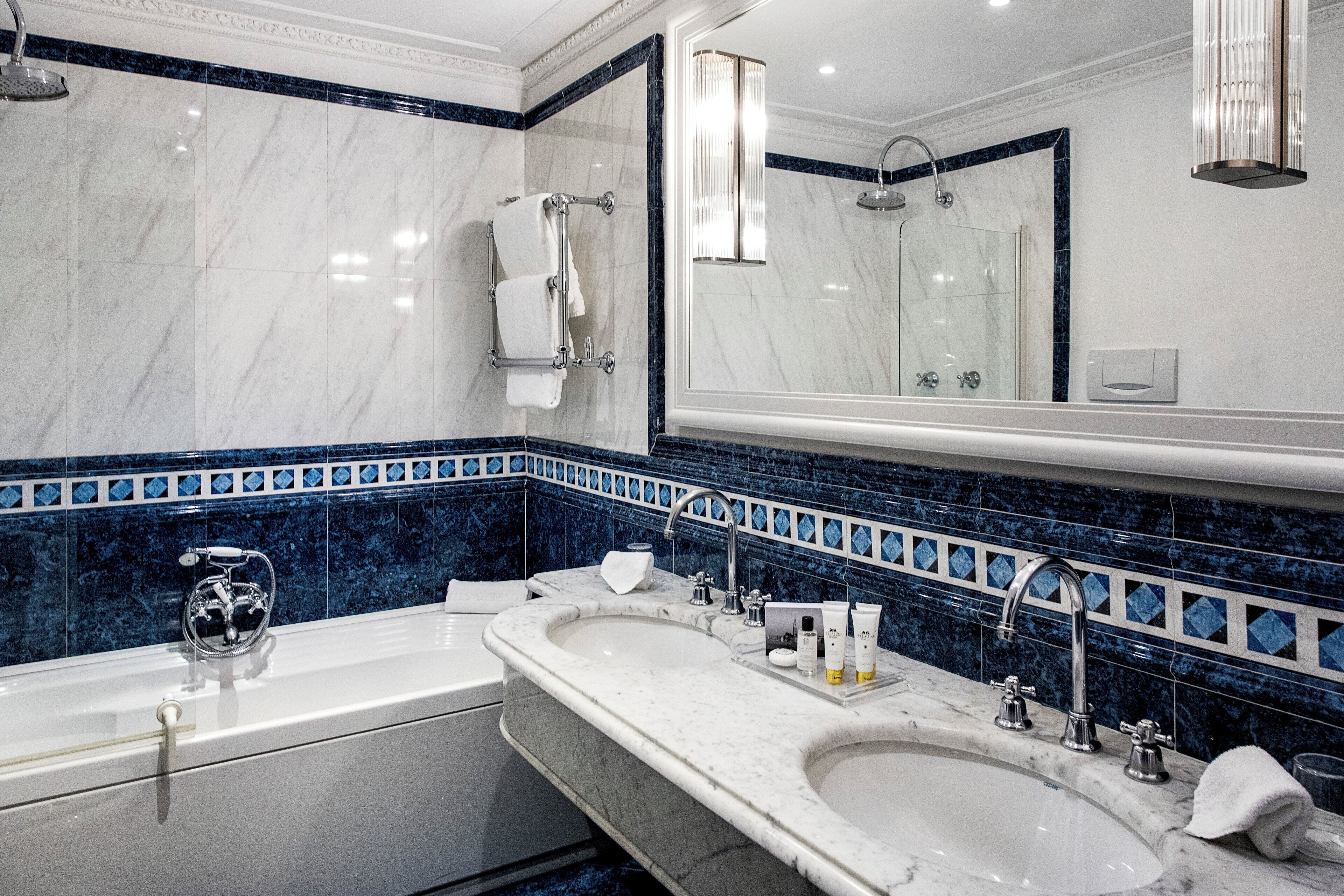 Rainfall showerhead, designer toiletries, hair dryer, bathrobes