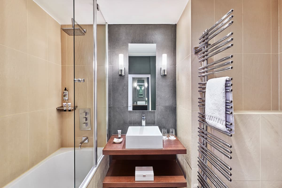 superior room, terrace, garden view | bathroom | bathrobes, towels