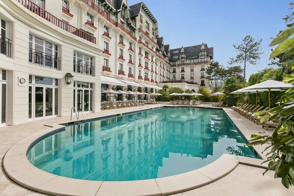 Indoor pool, seasonal outdoor pool, pool umbrellas, pool loungers