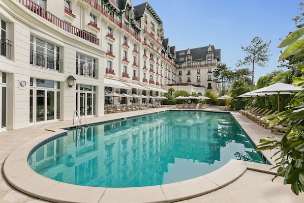 Indoor pool, seasonal outdoor pool, pool umbrellas, pool loungers