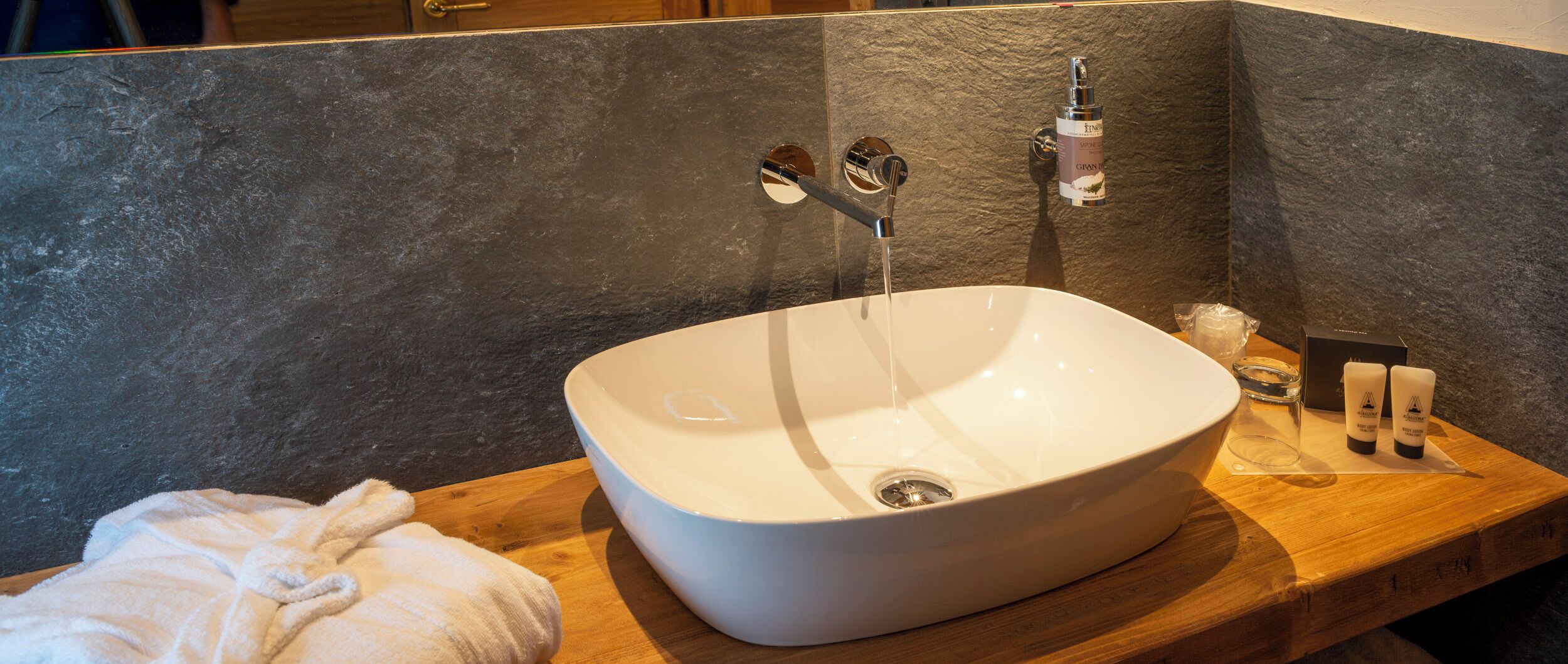 suite des artistes du mont blanc | bathroom | shower, rainfall showerhead, free toiletries, hair dryer