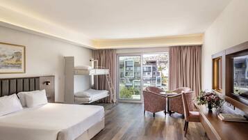 Family Room, City View | Minibar, in-room safe, desk, blackout curtains