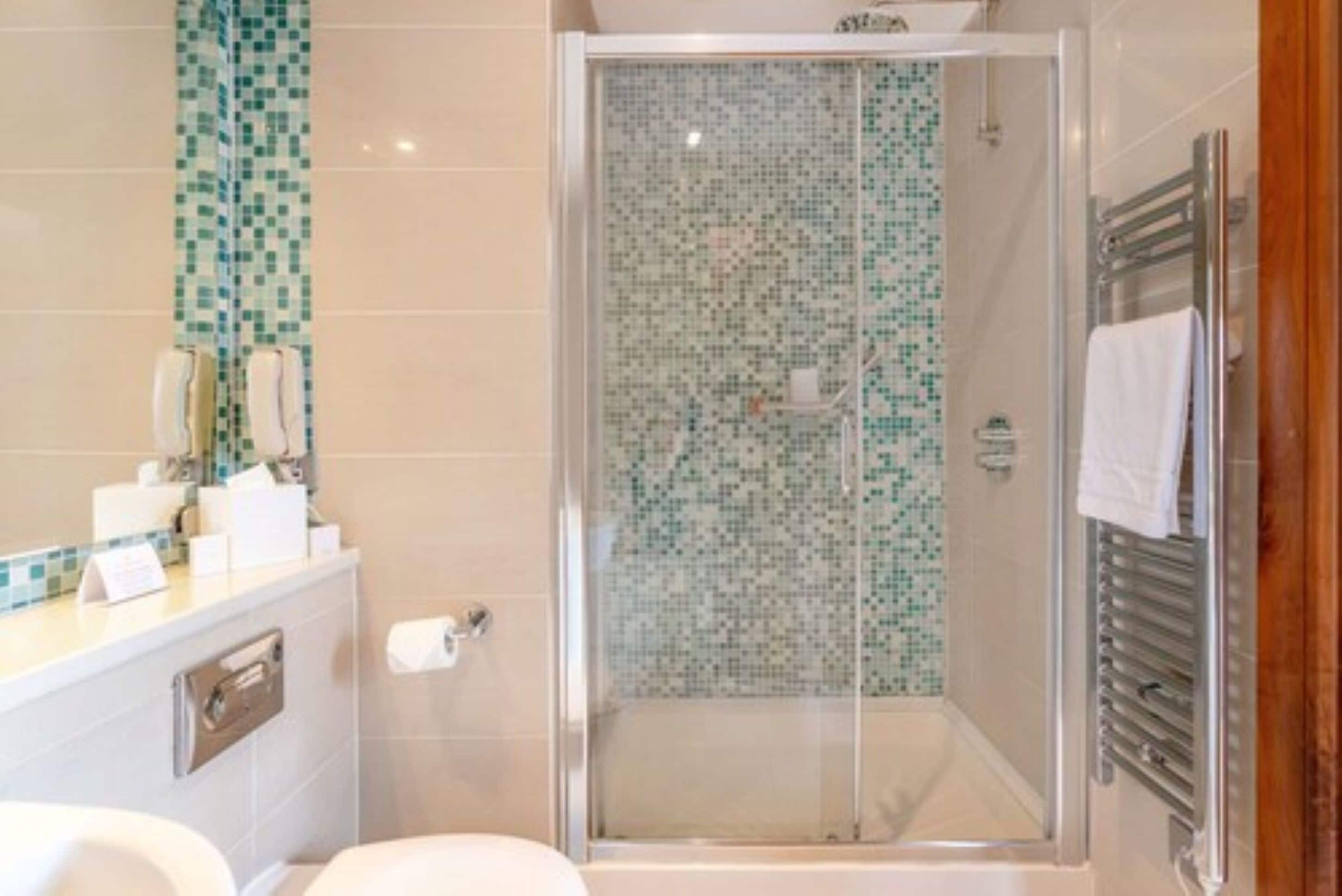 free toiletries, hair dryer, towels, shampoo