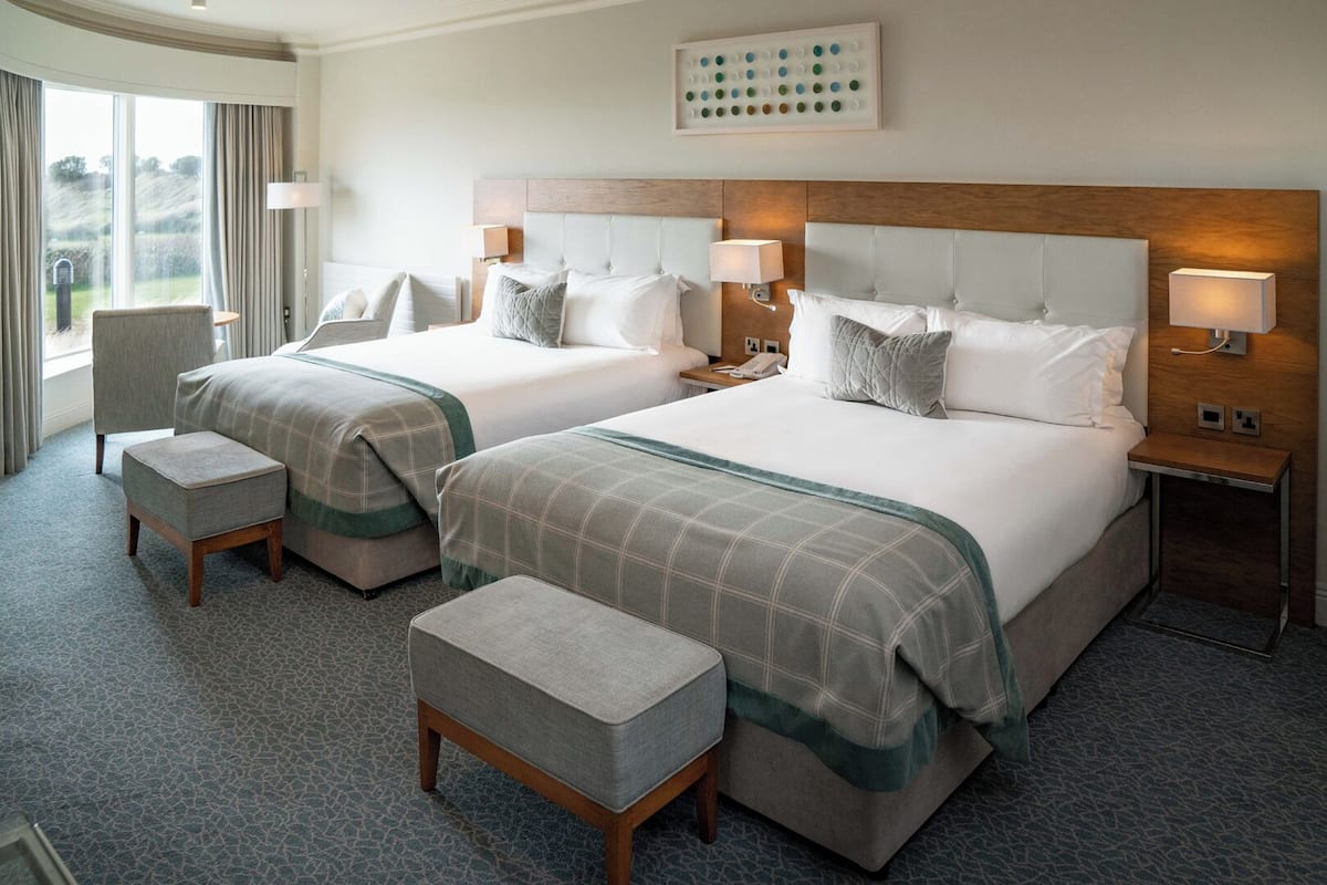 Executive Family Room, Garden View | Premium bedding, down comforters, pillowtop beds, in-room safe