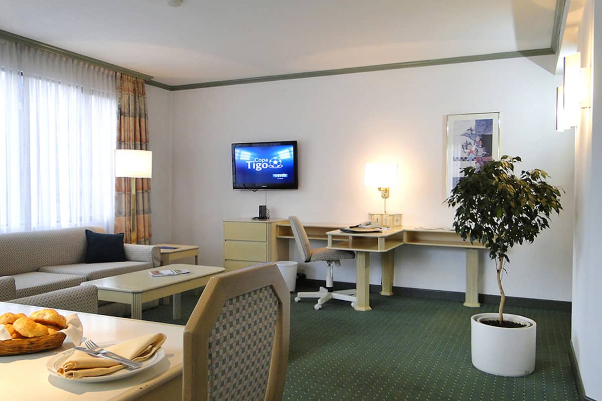 residence suite | living room | 42-inch led tv with digital channels, tv, heated floors