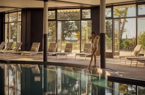 Indoor pool, seasonal outdoor pool, pool umbrellas, sun loungers