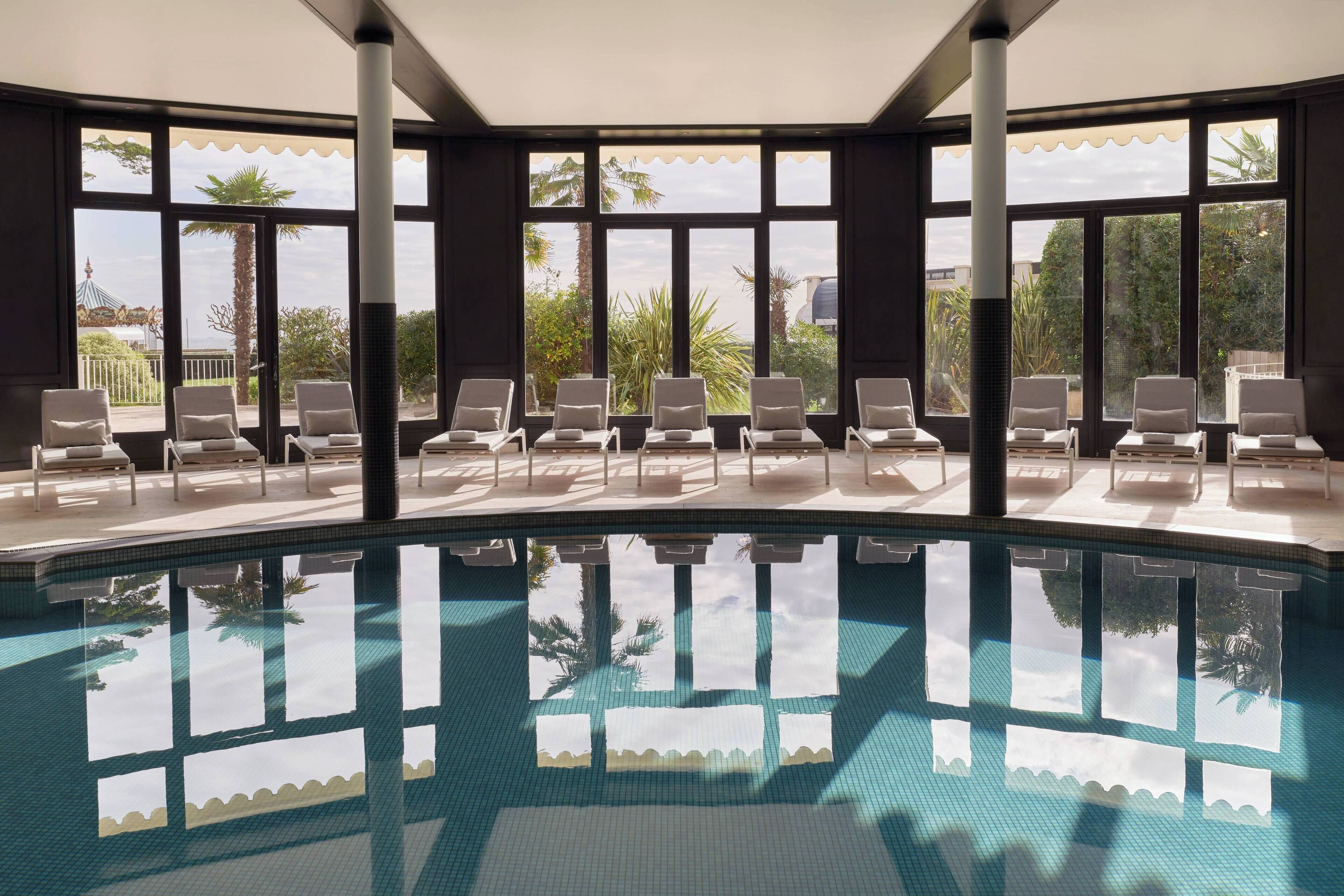 Indoor pool, seasonal outdoor pool, pool umbrellas, sun loungers