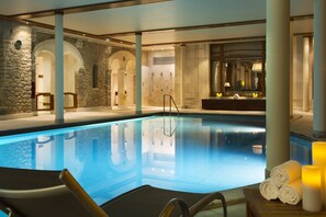 Indoor pool, seasonal outdoor pool, pool umbrellas, pool loungers