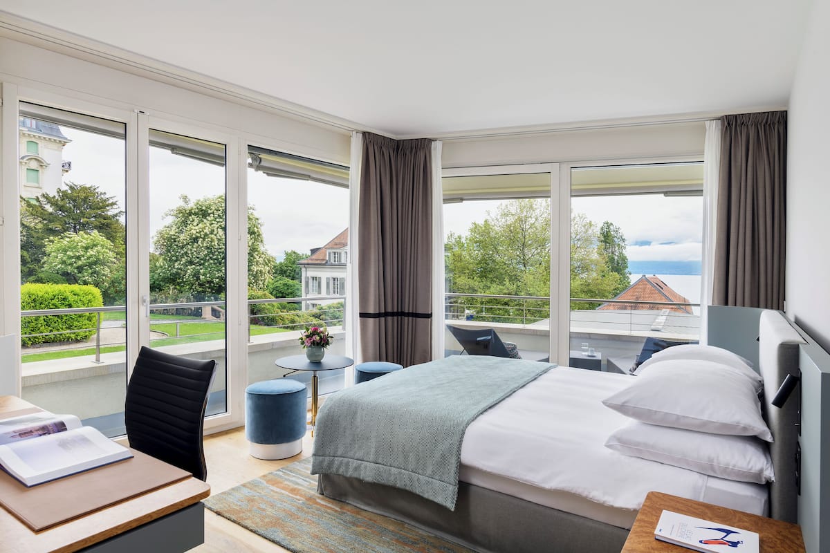 Camera Superior, vista lago | Biancheria da letto ipoallergenica, minibar, una cassaforte in camera
