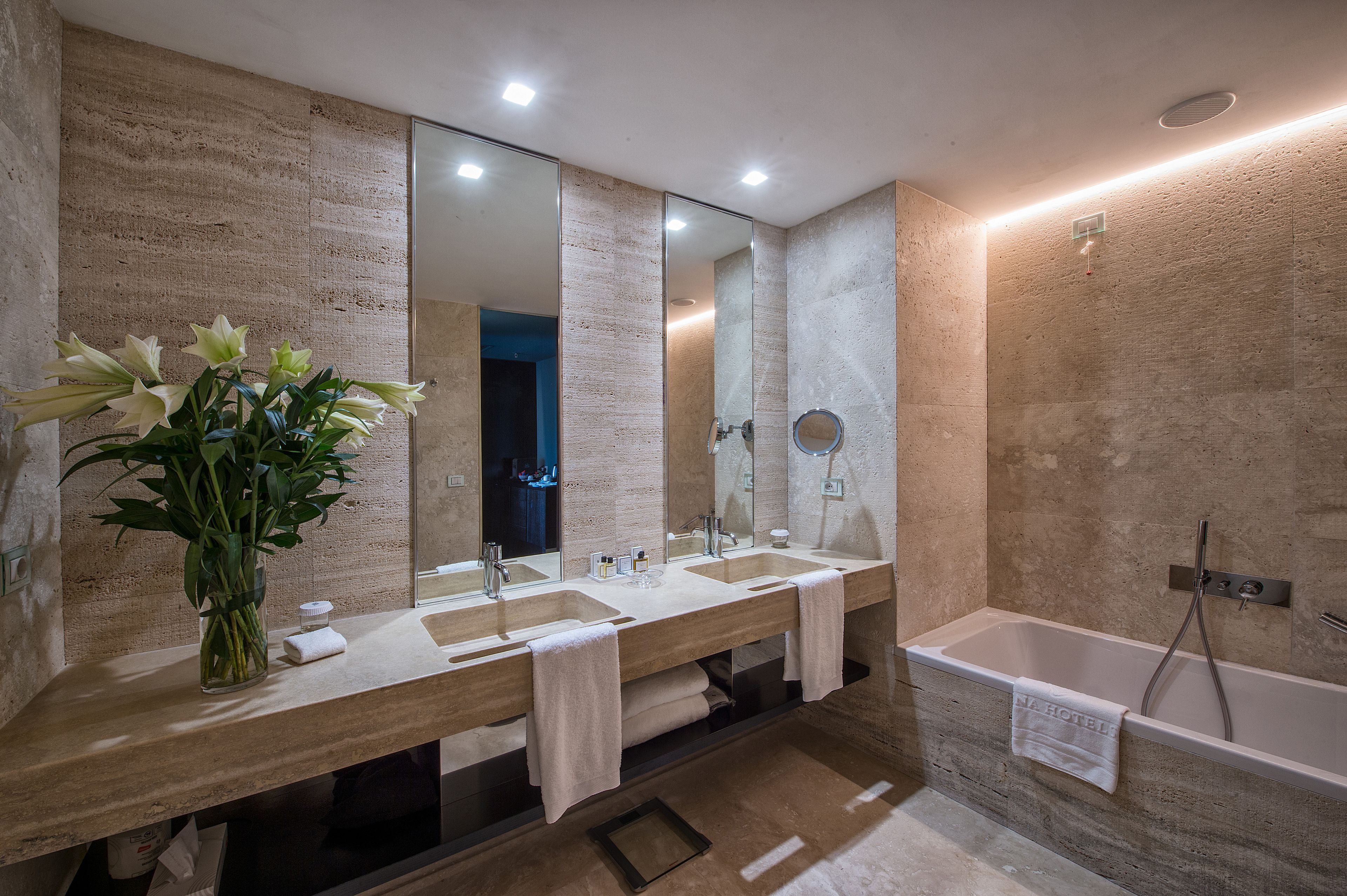 combined shower/bathtub, free toiletries, hair dryer, bathrobes