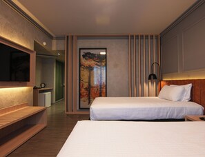 Hypo-allergenic bedding, pillow-top beds, minibar, in-room safe