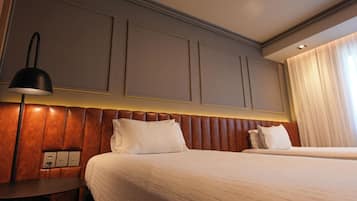 Hypo-allergenic bedding, pillow-top beds, minibar, in-room safe