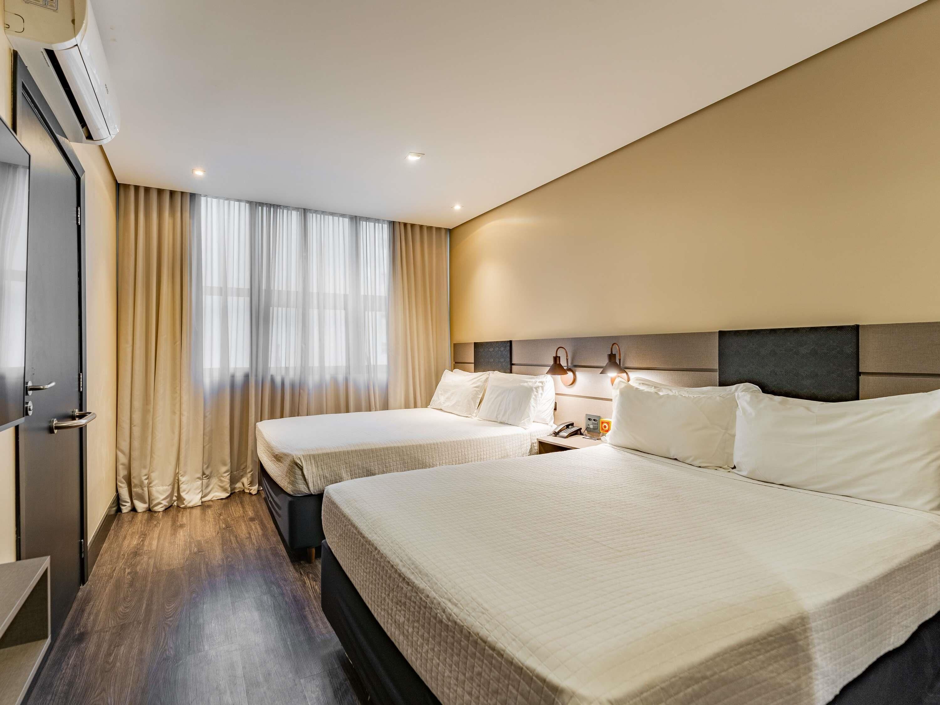 Hypo-allergenic bedding, pillow-top beds, minibar, in-room safe