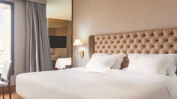 Hypo-allergenic bedding, pillow-top beds, minibar, in-room safe