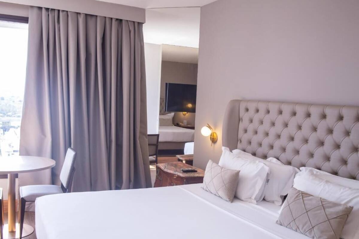 Hypoallergeen beddengoed, pillowtop-bedden, een minibar