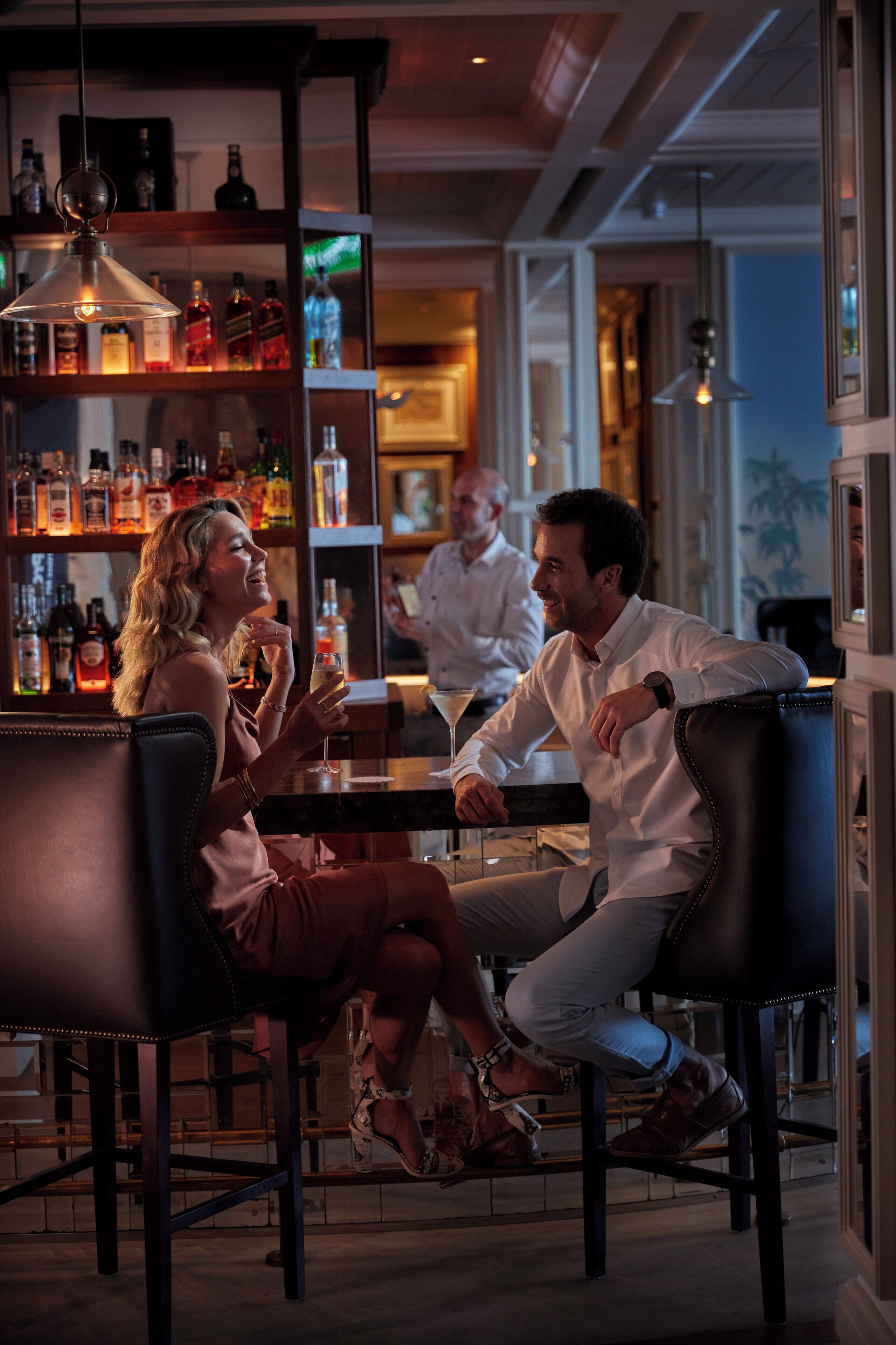 A bar area with seating and a bar counter.