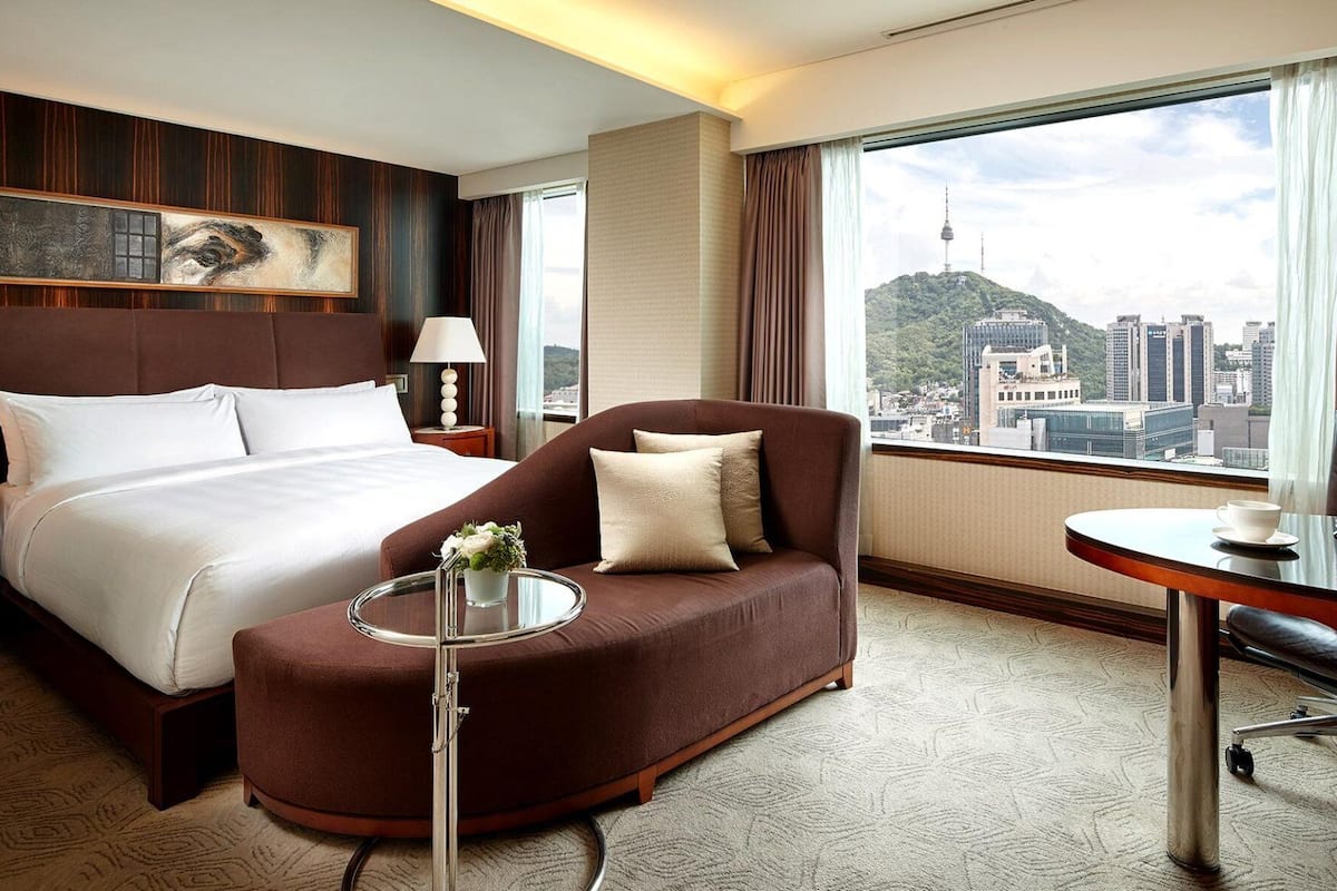 Egyptian cotton sheets, premium bedding, down duvets, minibar