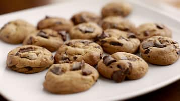 A plate of chocolate chip cookies.