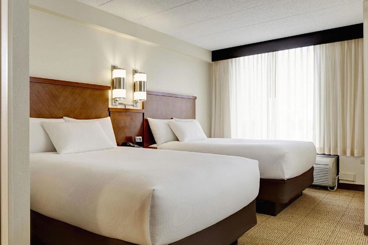 Premium bedding, down comforters, desk, laptop workspace