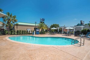 Outdoor pool, open 10:00 AM to 10:00 PM, pool umbrellas, pool loungers