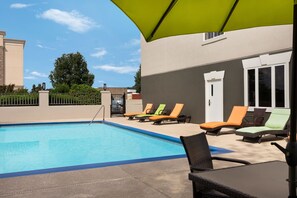 Outdoor pool, open 8:00 AM to 10:00 PM, sun loungers