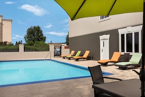 Outdoor pool, open 8:00 AM to 10:00 PM, sun loungers