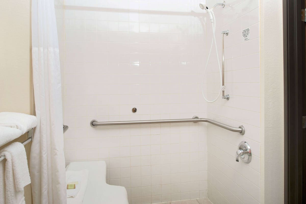 individually decorated, desk, laptop workspace, blackout curtains