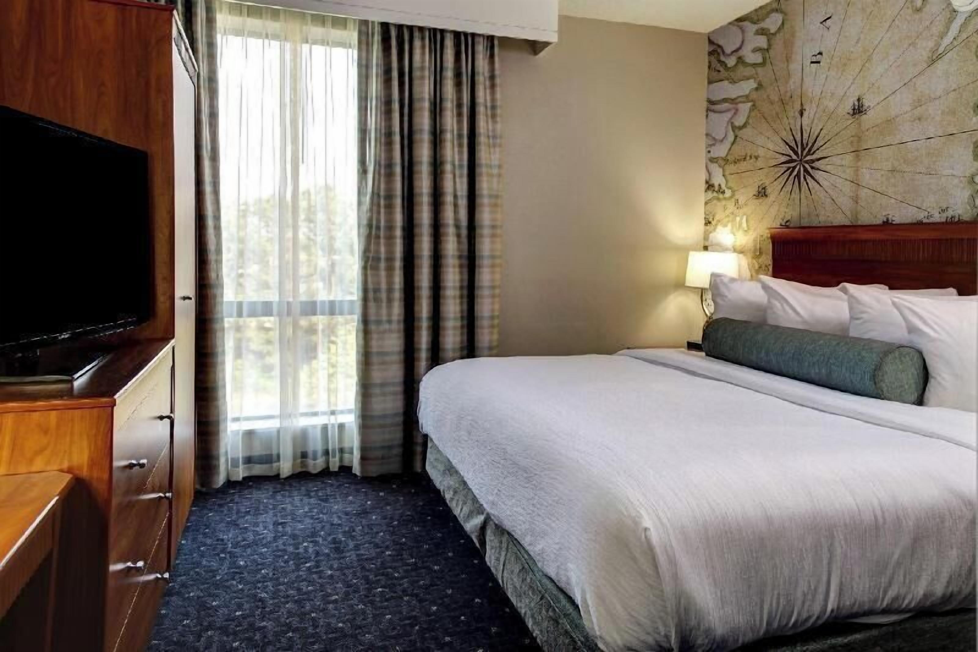 Premium bedding, down duvets, pillow-top beds, in-room safe